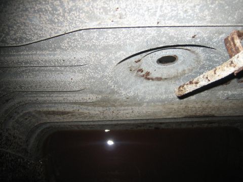 1976 Ford Ranchero - This photo shows the underside of a vehicle's frame, not a specific part like a gas tank.