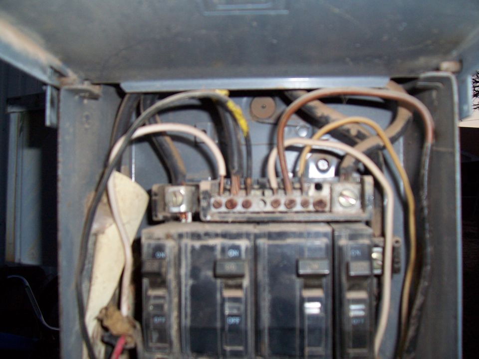 Electrical panel interior with circuit breakers and wiring