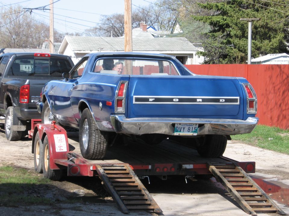 Blue 1976 Ford Ranchero rear view on trailer