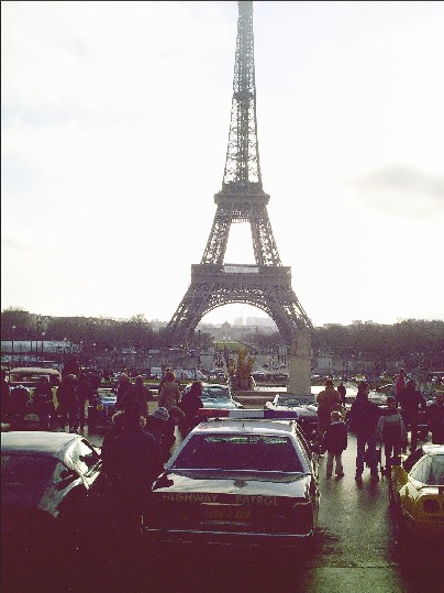 1991 Ford Crown Victoria - Police car parked with the Eiffel Tower visible in the distance.