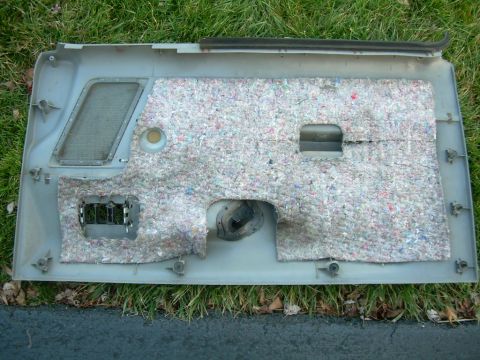 1988 Ford Bronco - This is a disassembled vehicle door panel, likely for a truck or SUV, showing the interior insulation and mounting points.