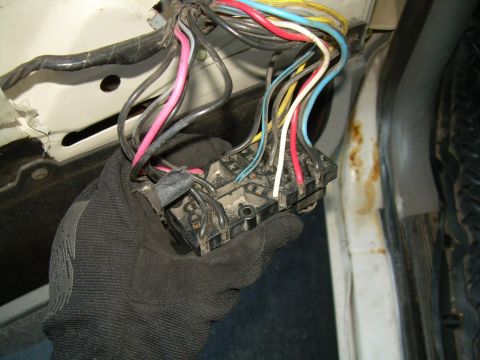 1988 Ford Bronco - Fuse box and wiring harness, likely from a vehicle's interior.