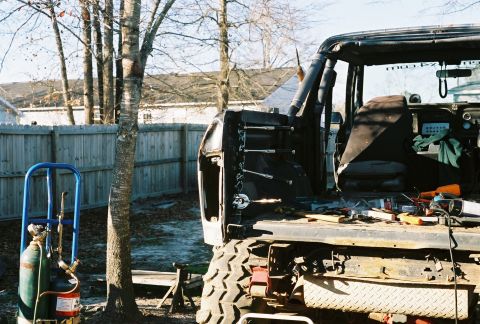 1978 Ford Bronco - This Jeep CJ is undergoing significant modification, with its body and interior partially removed.