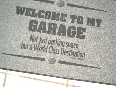 1986 Ford Bronco - A sign that reads 'Welcome to My Garage' is displayed, suggesting a special place for vehicles.