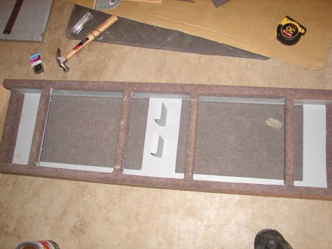 1996 Ford Bronco - Tools and materials laid out for installing a speaker enclosure.
