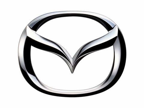 2006 Mazda Mazda 5 - Close-up of a chrome Mazda logo on a white background with website text at the bottom.