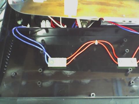 1993 Ford C-350 (Centurion Conversions) - The interior of a device shows a complex arrangement of wires and electrical components.