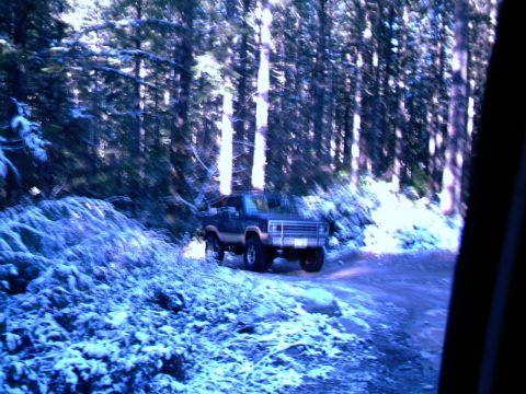 1987 Ford Bronco II - Driving a 1987 Ford Bronco II through a snowy forest road.