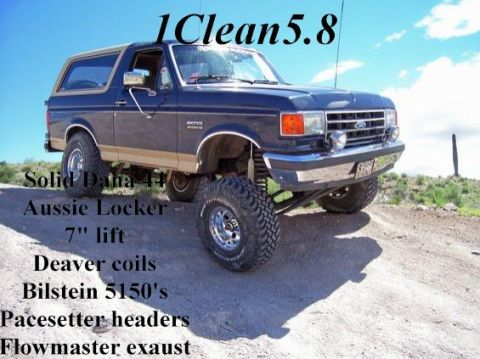 1991 Ford Bronco - This modified 1991 Ford Bronco is shown off-road with custom suspension and drivetrain upgrades.