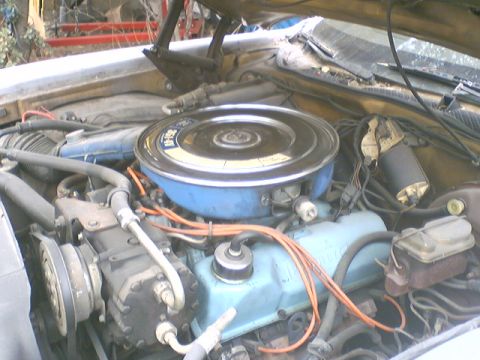 1973 Ford Ranchero - Engine bay view of a 1973 Ford Ranchero, showing the air cleaner and valve covers.