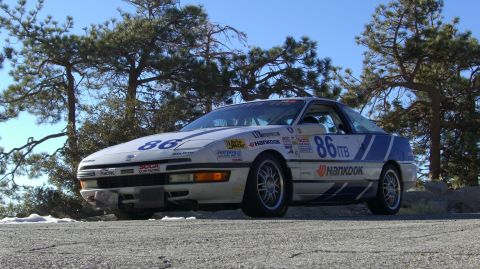 1990 Ford Probe - This 1990 Ford Probe is set up as a race car with numerous sponsor decals and the number 86 prominently displayed.