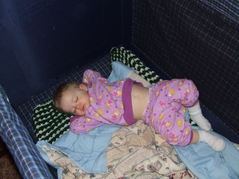 1990 Ford Bronco - Baby sleeping soundly in a crib.