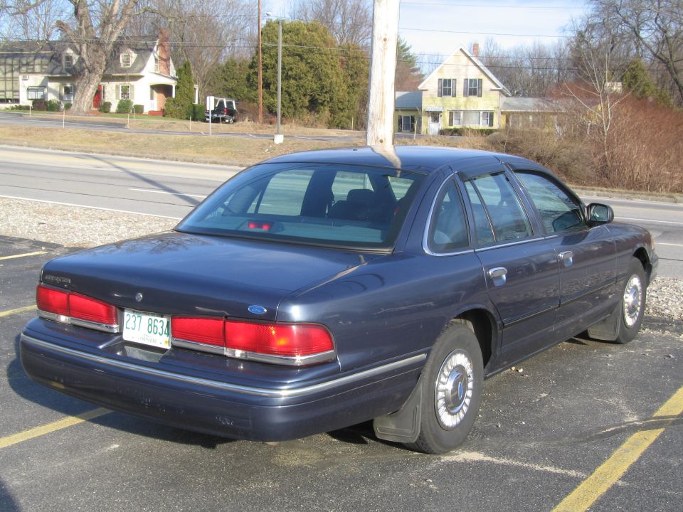 Dark blue 1991 Ford Crown Victoria LTD sedan, rear view