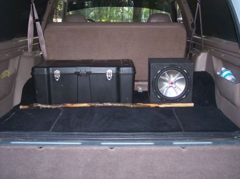 1996 Ford Bronco - My toolbox, subwoofer and red oak walking stick...the only problem with black carpet is that it shows every speck of dirt