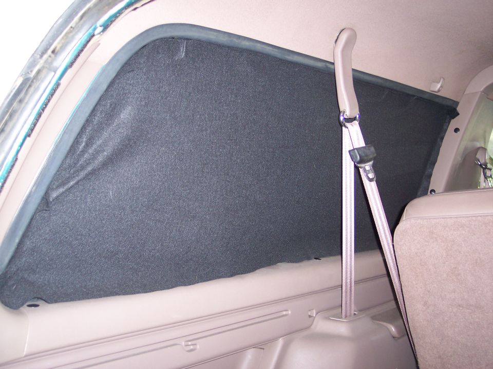 Black felt on the rear windows (so I can hide in the back - I'm a private eye and sometimes do surveillance in this vehicle)