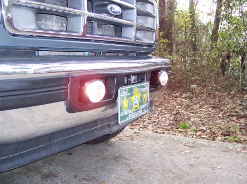 1996 Ford Bronco - This Ford truck features a chrome grille and bumper, with auxiliary lights and a Florida Sheriffs Association plate.
