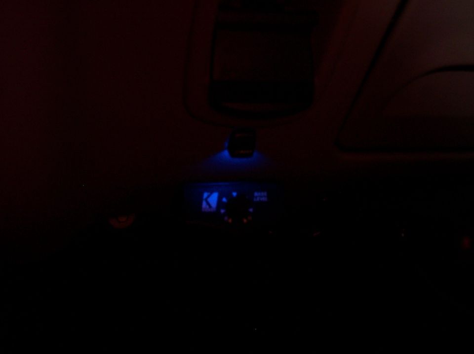 I mounted a little blue LED to light up the bass control know for the subwoofer at night. It's wired to come on with the instrument panel lights