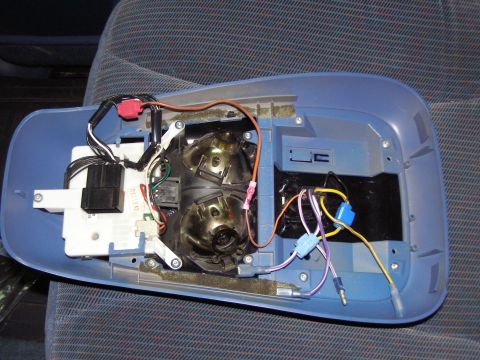 1994 Ford F-150 - Disassembled overhead console showing internal components and wiring harness.