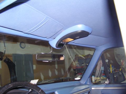 1994 Ford F-150 - Interior view of a 1994 Ford F-150, focusing on the overhead console and sun visors.
