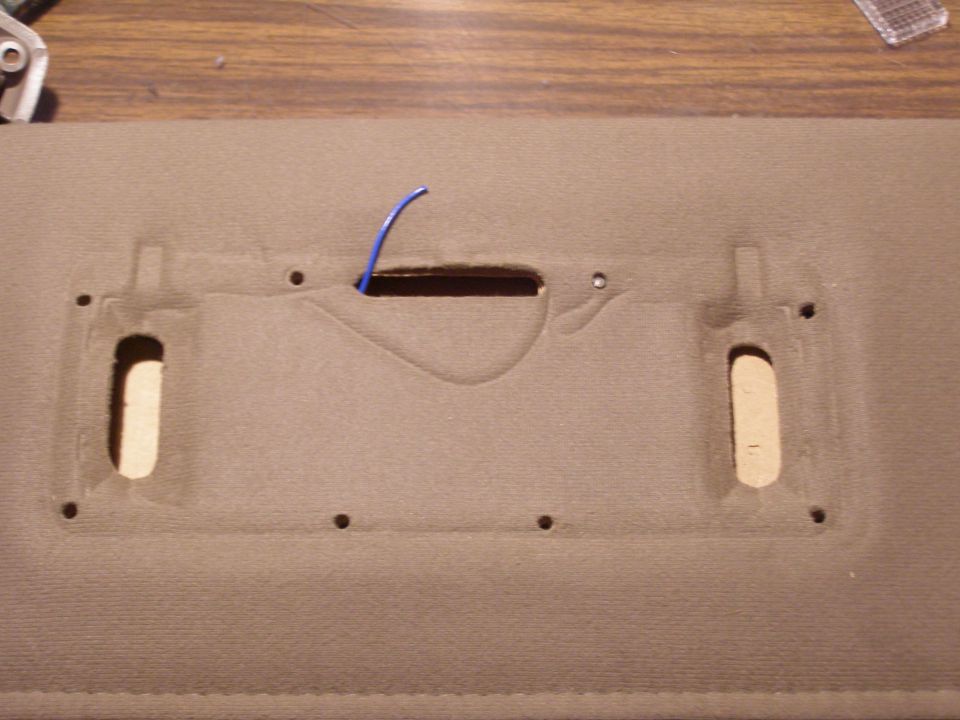 Sunvisor with blue wire and mounting holes