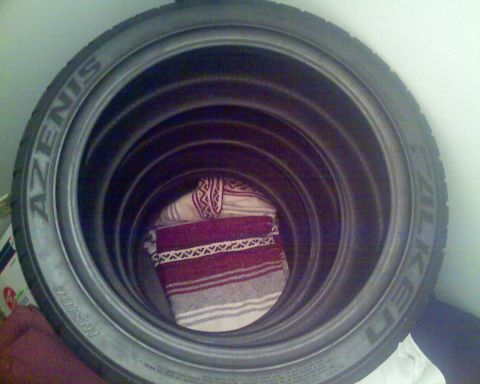 1993 Ford Probe - Stack of Falken Azenis tires, with a blanket inside the innermost tire.