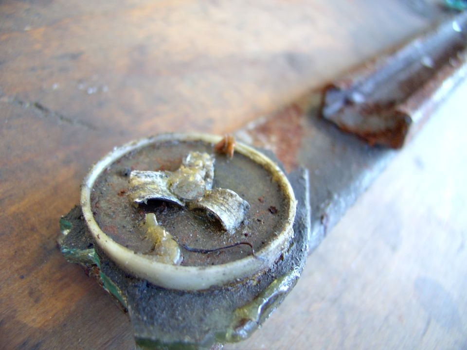 And the other side of the rivet, the part splayed at the factory.