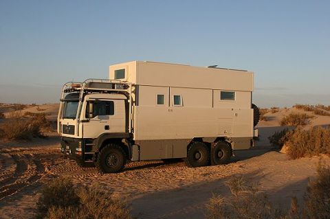 1993 Ford Bronco - This large, custom-built truck camper is equipped for off-road travel in arid environments.