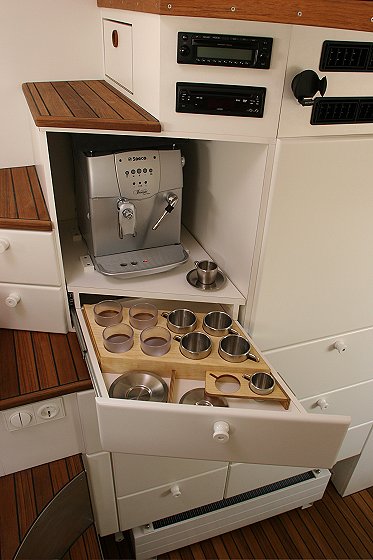 1993 Ford Bronco - This boat interior features a built-in espresso machine and storage for cups and saucers.