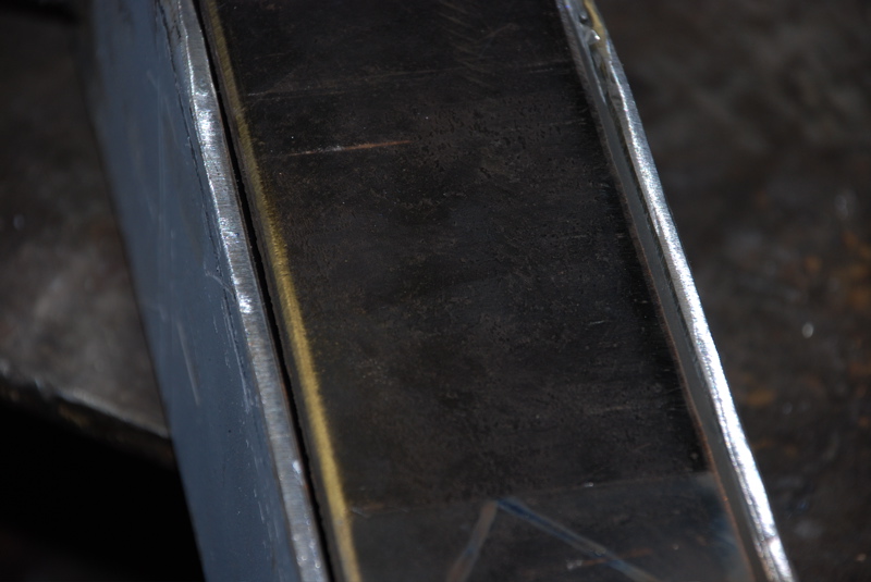 Close-up of a welded metal frame section