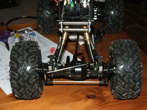 1996 Ford Bronco - Front suspension and wheels of a remote-controlled car are visible.