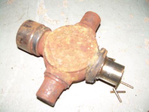 1988 Ford Bronco - This is a universal joint, a component used in driveshafts.