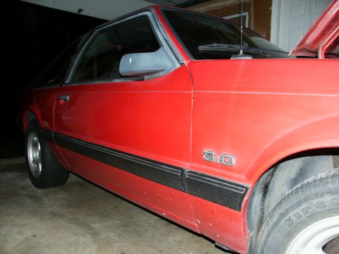 1990 Ford Mustang - This 1990 Ford Mustang 5.0 coupe is shown from the 3/4 front angle.