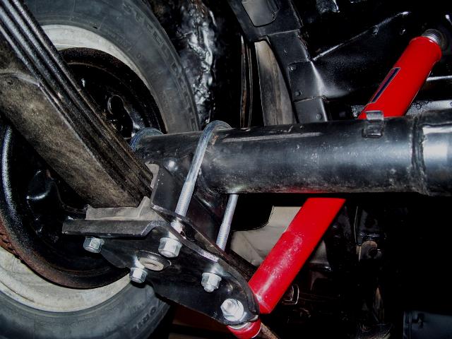 1971 Ford Ranchero rear suspension with red shock absorbers and leaf springs