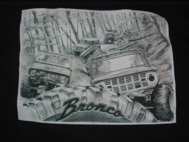 Drawing of several Ford Broncos driving on a dirt path in a forest. A tire with 'Bronco' written on it is in the foreground