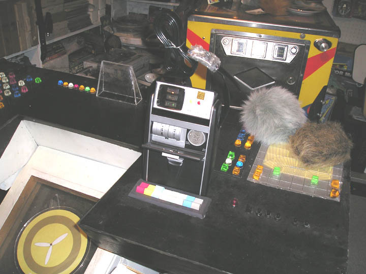 Star Trek console replica with toy cars and fuzzy microphone covers