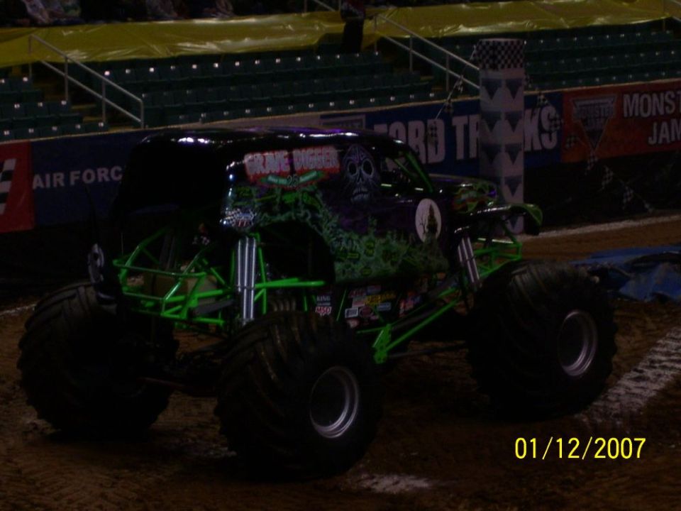 Grave Digger monster truck, 3q-front view, black and green