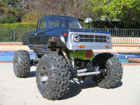 1985 Ford Bronco - This remote-controlled truck features a Ford grille and oversized off-road tires.