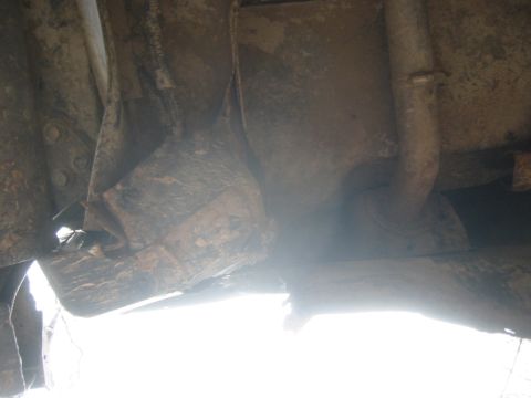 1995 Ford Bronco - drivers side rear corner damage from tire loss on freeway.