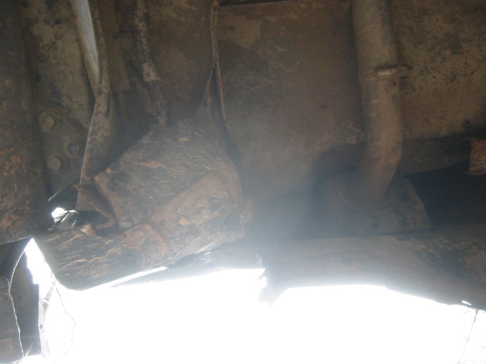 drivers side rear corner damage from tire loss on freeway.