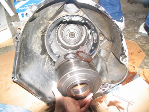 1978 Ford Bronco - A disassembled automatic transmission with the torque converter removed from its housing.