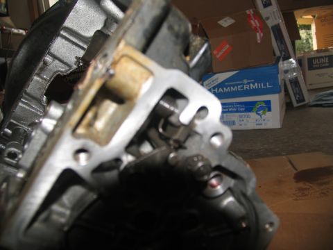 1978 Ford Bronco - A detailed view of a disassembled transmission part, showing intricate mechanical components.