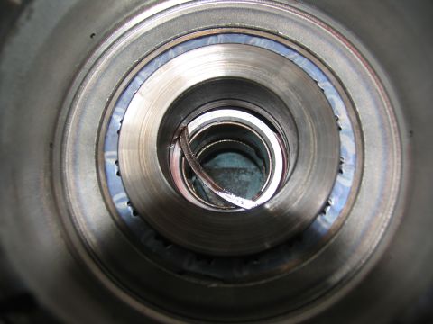 1978 Ford Bronco - A damaged transmission component shows a bent metal piece, indicating a potential failure within the drivetrain.