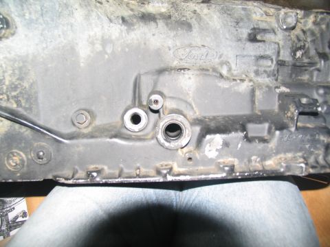 1978 Ford Bronco - Ford engine part shown in detail, likely from a transmission rebuild project.