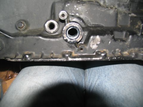 1978 Ford Bronco - Close-up of a vehicle's transmission housing, showing mechanical components.