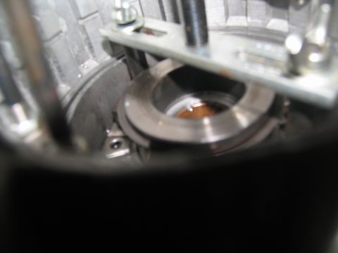 1978 Ford Bronco - A close-up view of a transmission component during a rebuild process.