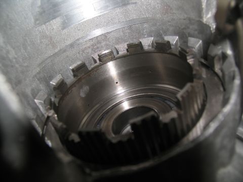 1978 Ford Bronco - A close-up view of a damaged transmission component, showing worn splines and a central circular opening.