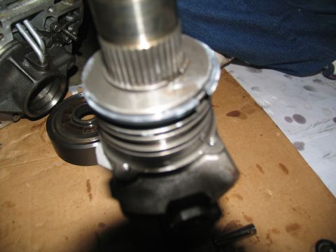 1978 Ford Bronco - A close-up view of a transmission part, likely during a rebuild process.