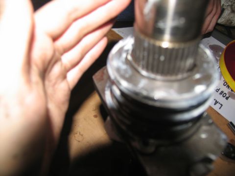 1978 Ford Bronco - A metal shaft with splines is shown, with a hand partially obscuring the view on the left side.
