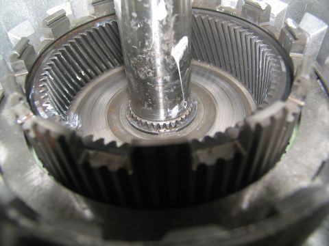 1978 Ford Bronco - Internal view of a transmission's planetary gear set, showing intricate metal components.