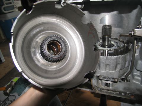 1978 Ford Bronco - This image shows internal components of an automatic transmission, specifically the torque converter and a planetary gear set.